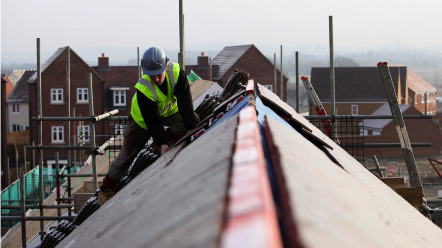 builder working on roof sustaibility