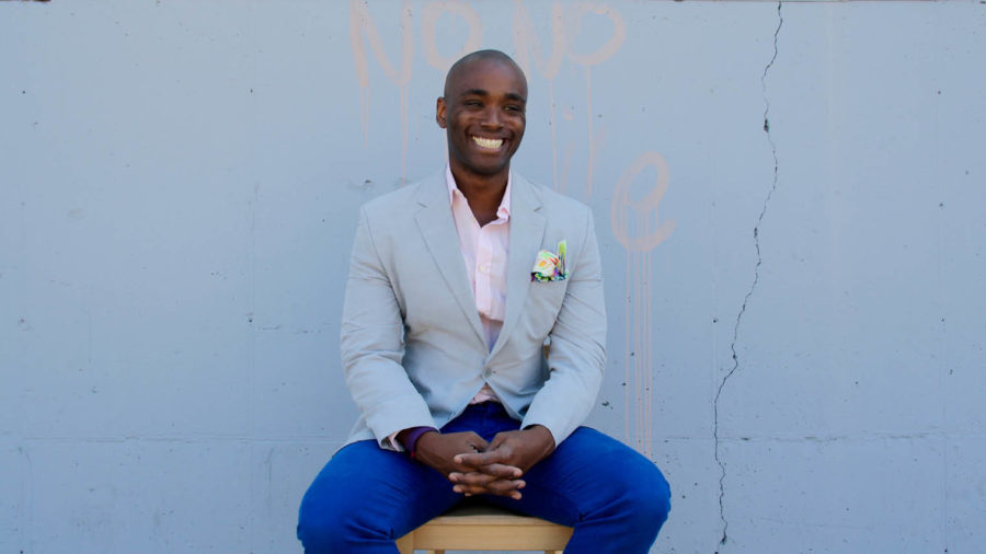 wifi engineer LeRon Barton sitting in front of a white wall